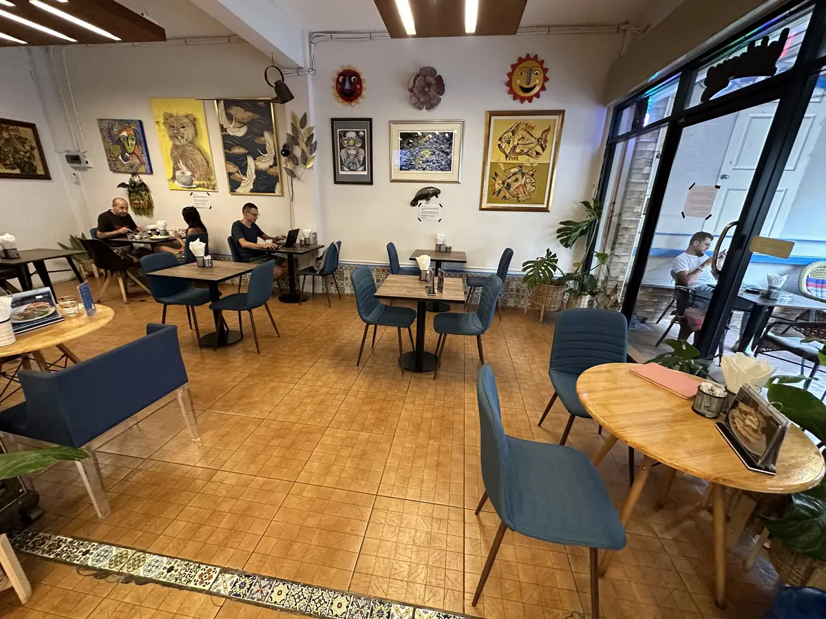 Cozy corner with artwork inside Co & Caffè, Pattaya